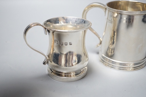 A George V silver christening mug, Goldsmiths & Silversmiths Co. Ltd, London, 1915, 85mm and a smaller Scottish silver christening mug, 9oz.